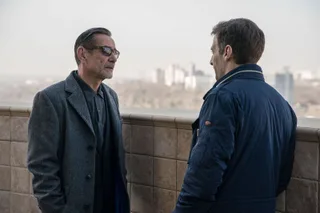 The Bureau: Malotru in a tense conversation on a rooftop terrace